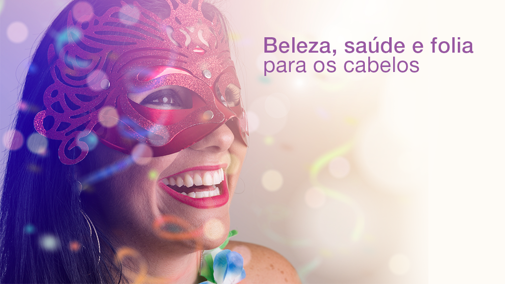 Mulher sorrindo com mascara de carnaval, e escrito na imagem: Beleza, saúde e folia para os seus cabelos 